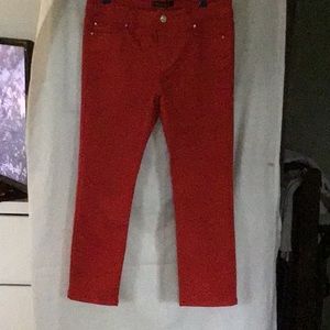 Brand new beautiful red capris size. 2 woman